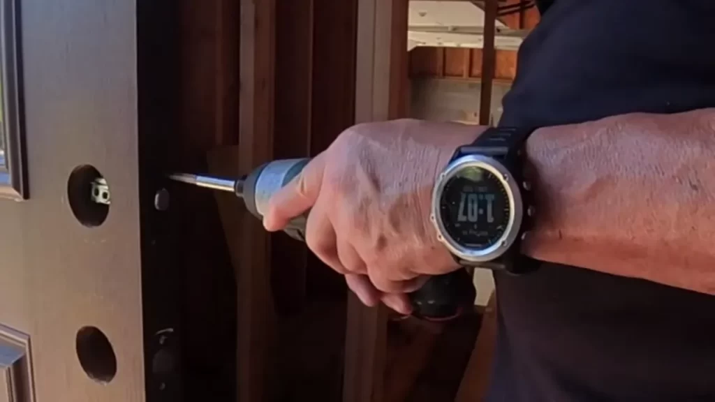 Use a template to outline the deadbolt and strike plate positions