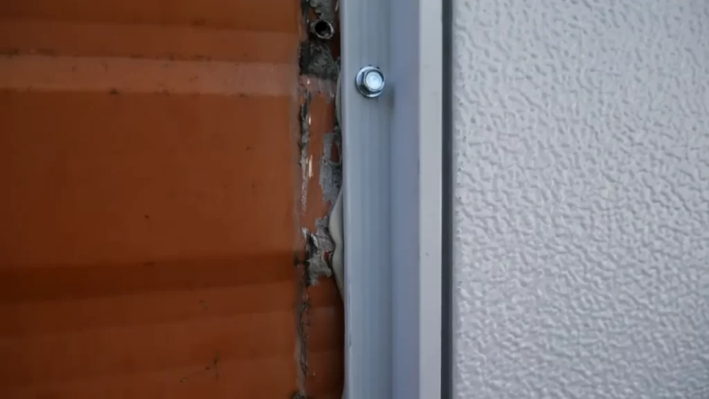 Measuring the width and height of the door frame