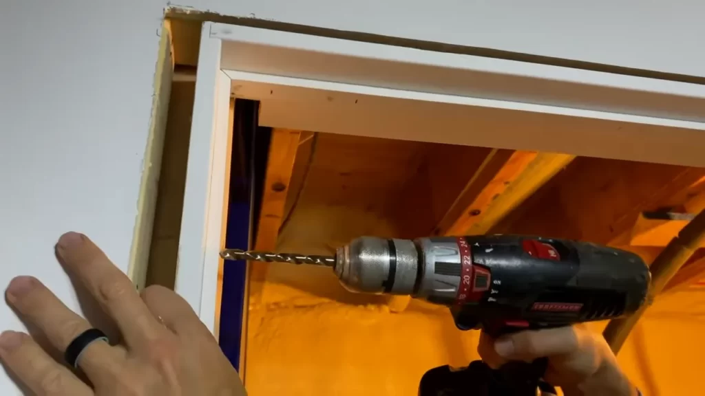 Checking the level and plumb of the opening