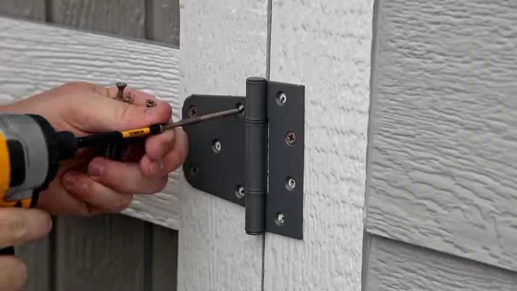 Drilling Pilot Holes for the Hinge Screws