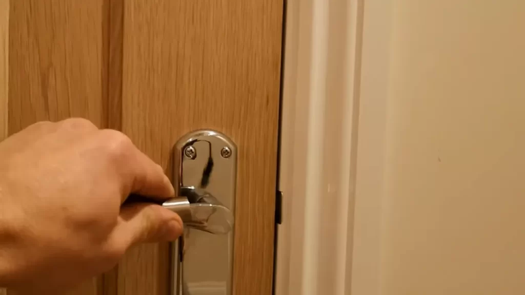 Measure the door to determine latch plate placement