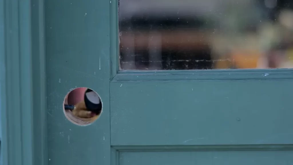 Measuring and marking the door for optimal deadbolt placement