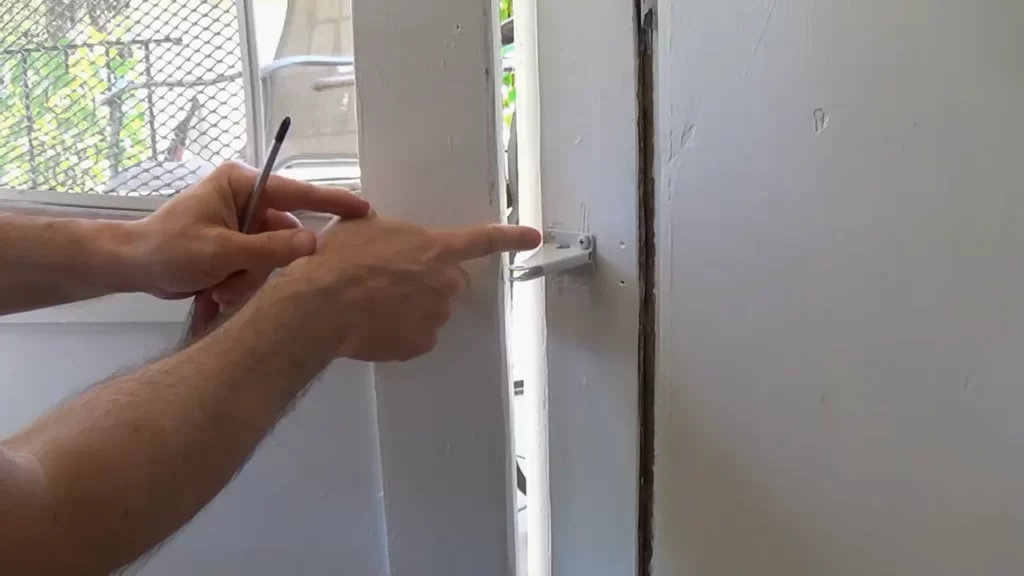 Attaching The Brackets To The Door And Door Frame