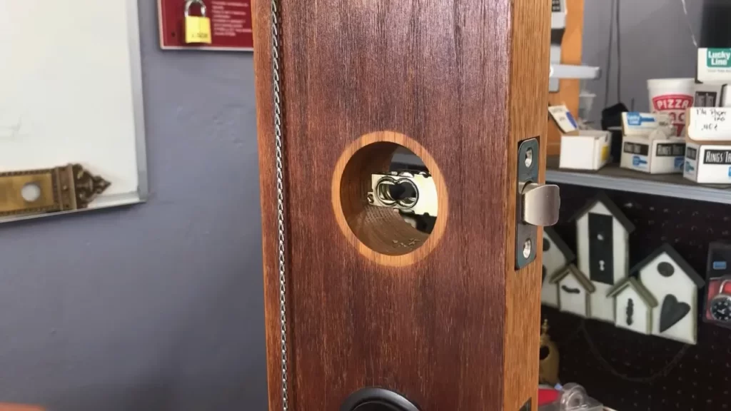 Removing the screws or bolts from the old door handle