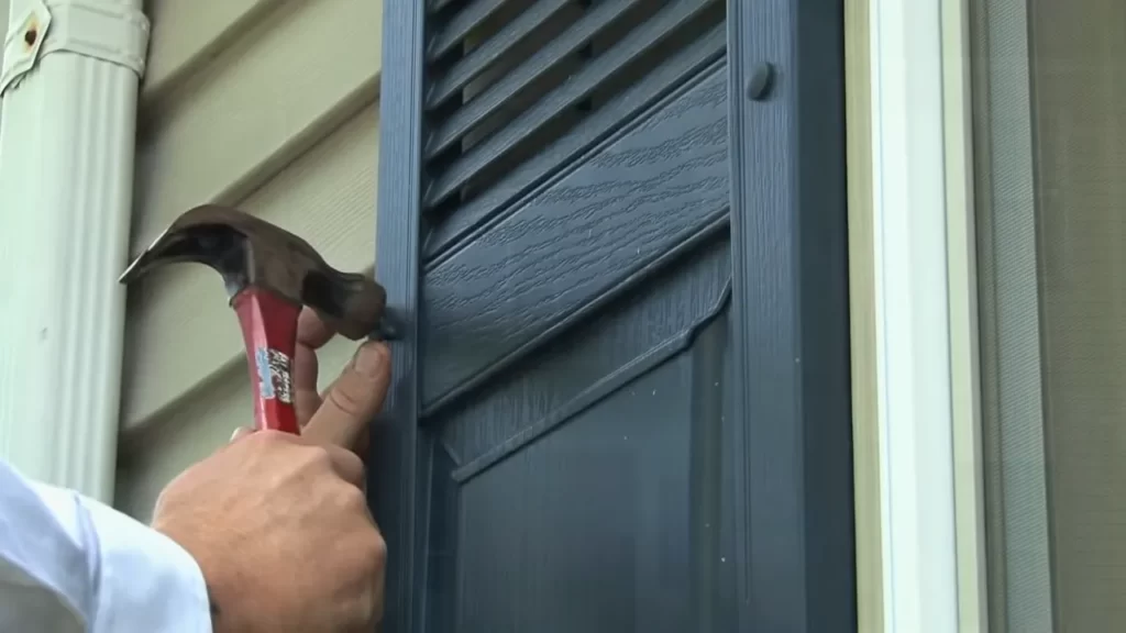Use a level to ensure that the shutters are straight.